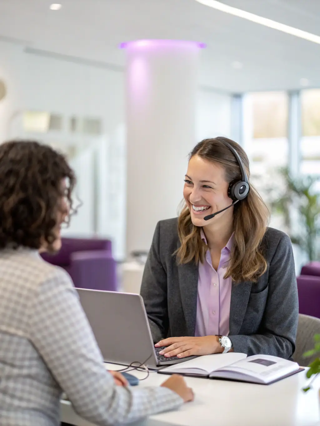 A picture of a friendly customer service representative assisting a client, showcasing the personalized support offered by ADFLOR TRANS NETRE.